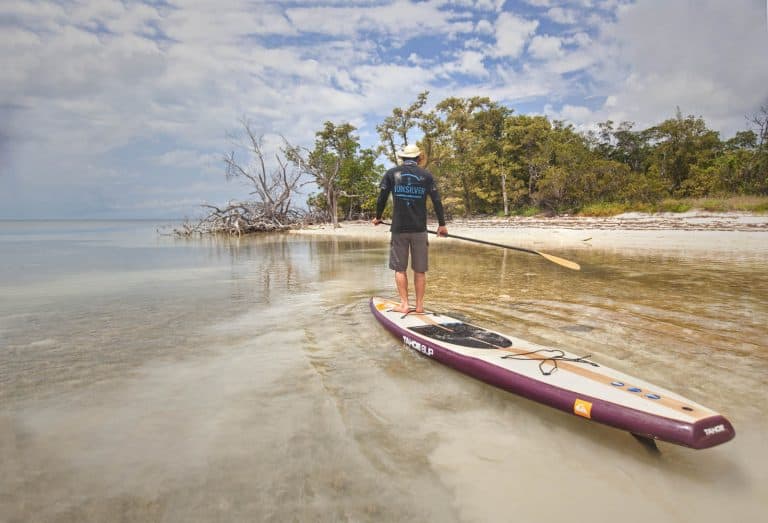 Justin Riney on his paddle board in Key West, Florida.